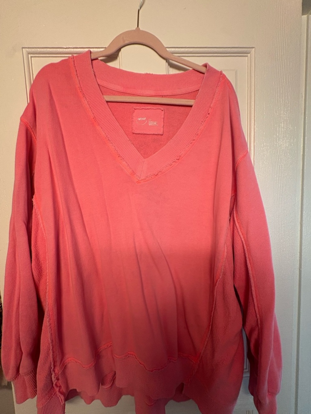 Arie Oversized V-Neck Sweatshirt in Coral Pink